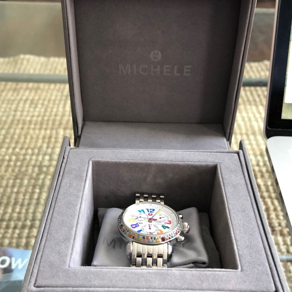 Michele carousel color full dial ladies watch.